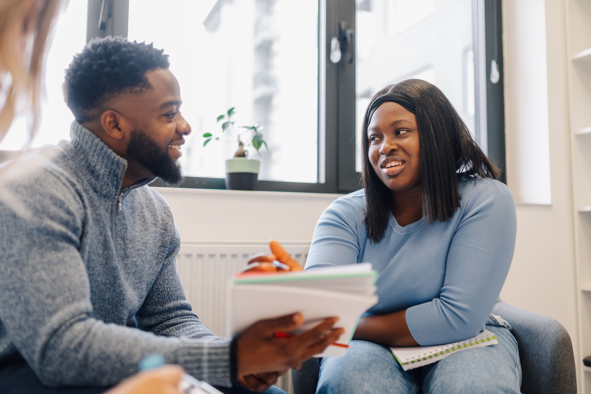 Students collaborating and discussing notes in university study group